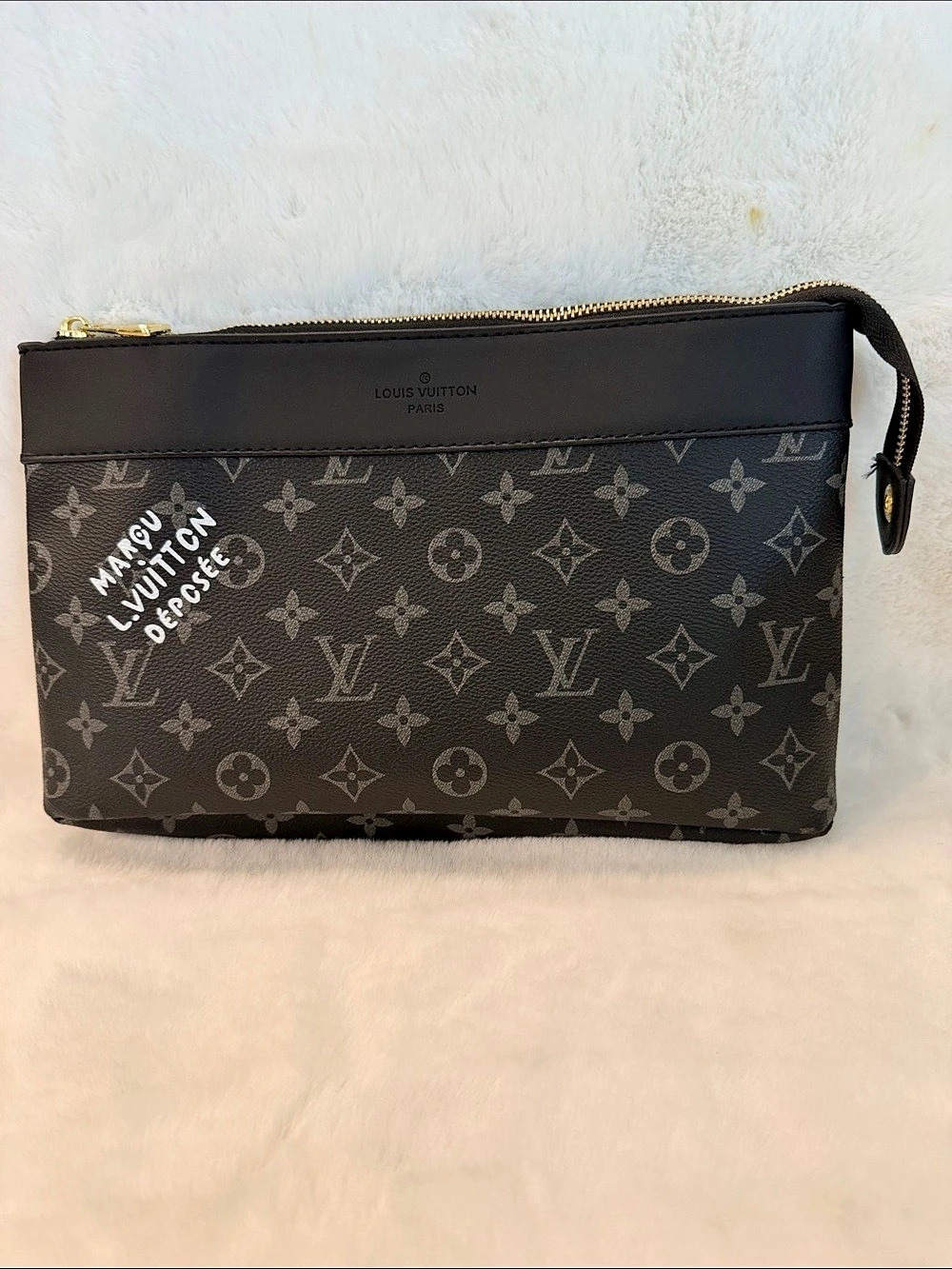 NWOT Monogram Wristlet in Black with tan interior.